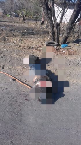 Localizan cadáver embolsado